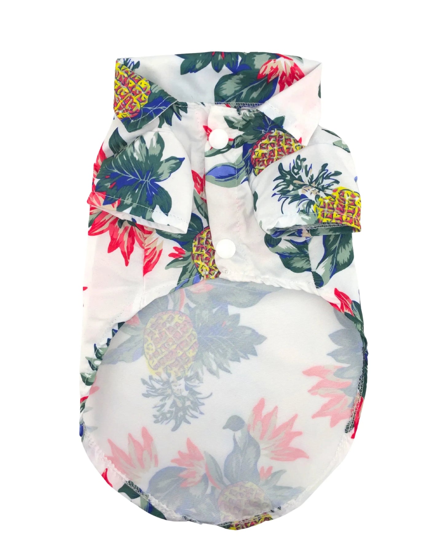 Camisa hawaiana para perros con estampado floral brillante y piñas sobre fondo blanco.